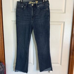 Seven7 Dark Blue Straight Leg Jeans, with cut look at bottom.
